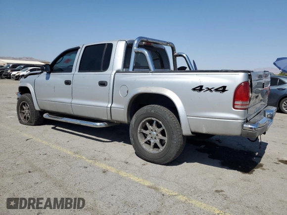 2004 Dodge Dakota SLT with VIN 1D7HG48N74S509797, listed as a Copart auction lot 57797055 with 214,275 mi miles and Salvage title. Bid and sale history available at DreamBid. Image 2.