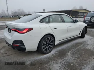 2023 BMW 4 Series 430i xDrive with VIN WBA73AV03PFP03200, listed as a Copart auction lot 87922935 with 44,003 mi miles and Salvage title. Bid and sale history available at DreamBid. Image 3.