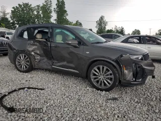 2020 Cadillac XT6 AWD Sport with VIN 1GYKPGRS1LZ135807, listed as a Copart auction lot 59079044 with 152,771 mi miles and Non Repairable. Bid and sale history available at carsss.com. Image 4.