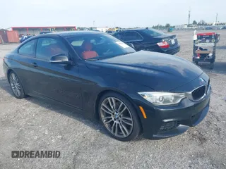 2015 BMW 4 Series 428i with VIN WBA3N3C56FK233866, listed as a IAAI auction lot 41983330 with 218,017 mi miles and . Bid and sale history available at carsss.com. Image 1.