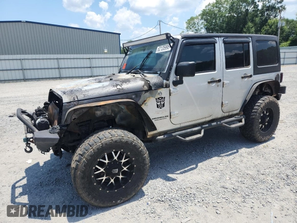 2007 Jeep Wrangler Unlimited Sahara с VIN 1J4GA59167L183198, выставлен на аукционе Copart как лот 62135995 с пробегом Не указан миль и Списание • Salvage title. История ставок и продаж доступна на DreamBid. Изображение 1.