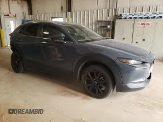 2024 Mazda CX-30 2.5 S Carbon Edition with VIN 3MVDMBCM7RM624600, listed as a Copart auction lot 49343975 with 22,510 mi miles and Salvage Title. Bid and sale history available at carsss.com. Image 4.