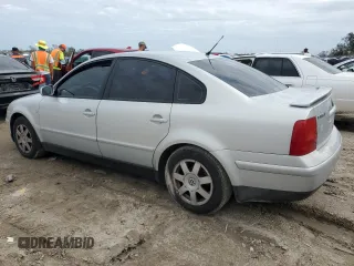 1999 Volkswagen Passat GL z VIN WVWMD63B1XE216281, wystawiony jako Copart lot #75200694 z przebiegiem Nie podano mil oraz Nie do naprawy • Non repairable. Historia ofert i sprzedaży dostępna na DreamBid. Obrazek 2.