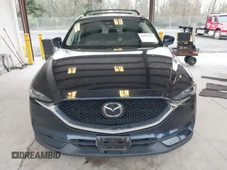 2018 Mazda CX-5 Grand Touring with VIN JM3KFBDM4J0302870, listed as a IAAI auction lot 41934217 with 57,151 mi miles. Bid and sale history available at carsss.com. Image 13.