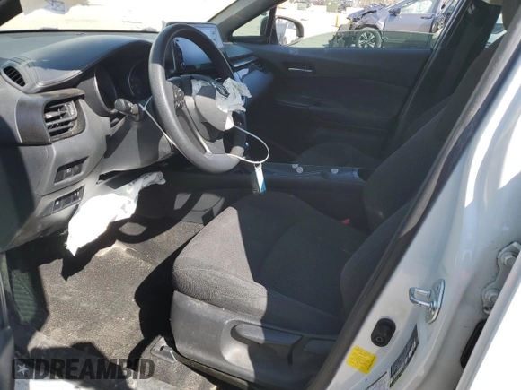 2019 Toyota C-HR XLE with VIN NMTKHMBX2KR098238, listed as a Copart auction lot 52338025 with 57,933 mi miles and Salvage Title. Bid and sale history available at DreamBid. Image 7.