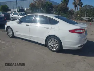 2014 Ford Fusion SE Hybrid with VIN 3FA6P0LU5ER256992, listed as a IAAI auction lot 42229147 with 235,583 mi miles and . Bid and sale history available at DreamBid. Image 3.