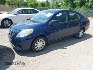 2012 Nissan Versa SV with VIN 3N1CN7AP6CL899654, listed as a IAAI auction lot 42166459 with 121,062 mi miles. Bid and sale history available at carsss.com. Image 2.