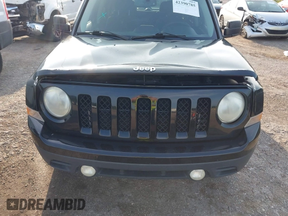 2014 Jeep Patriot Sport with VIN 1C4NJPBA3ED720412, listed as a IAAI auction lot 42390785 with 215,446 mi miles and . Bid and sale history available at DreamBid. Image 6.