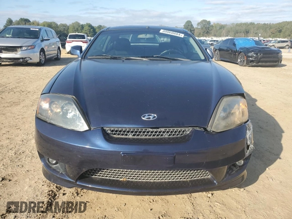 2005 Hyundai Tiburon GT z VIN KMHHN65F85U158764, wystawiony jako Copart lot #80060884 z przebiegiem 121 747 mil mil oraz Czysty tytuł • Clean title. Historia ofert i sprzedaży dostępna na DreamBid. Obrazek 5.