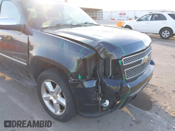 2010 Chevrolet Suburban LTZ with VIN 1GNUKKE3XAR142743, listed as a IAAI auction lot 41413380 with 236,384 mi miles. Bid and sale history available at carsss.com. Image 6.