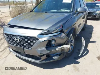 2019 Hyundai Santa Fe SEL Plus z VIN 5NMS33AD6KH099865, wystawiony jako IAAI lot #42007106 z przebiegiem 103 095 mil mil oraz . Historia ofert i sprzedaży dostępna na DreamBid. Obrazek 6.