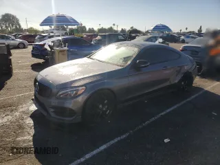 2018 Mercedes-Benz C C 300 with VIN WDDWJ4JB4JF677877, listed as a Copart auction lot 85105594 with 82,067 mi miles and Salvage Title. Bid and sale history available at carsss.com. Image 1.