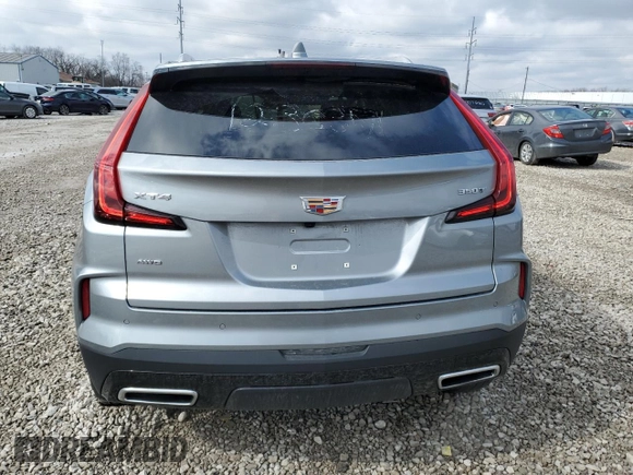 2024 Cadillac XT4 AWD Premium Luxury with VIN 1GYFZDR40RF123637, listed as a Copart auction lot 46852195 with 5,001 mi miles and Salvage title. Bid and sale history available at DreamBid. Image 6.