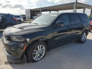 2021 Dodge Durango R/T with VIN 1C4SDHCTXMC693309, listed as a Copart auction lot 57399455 with 115,053 mi miles and Salvage title. Bid and sale history available at DreamBid. Image 1.