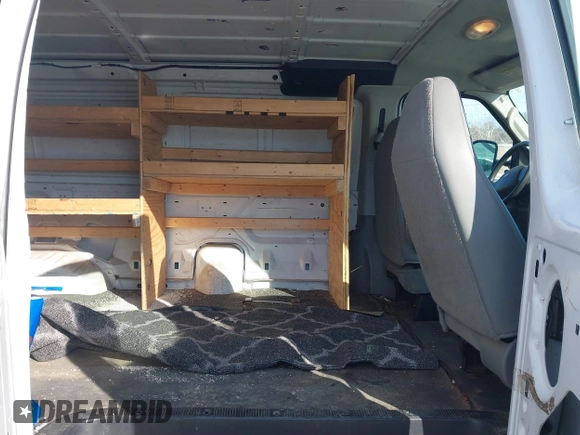 2007 Ford Econoline Cargo Commercial with VIN 1FTNE14W47DB31284, listed as a IAAI auction lot 41547430 with 85,413 mi miles and . Bid and sale history available at DreamBid. Image 8.