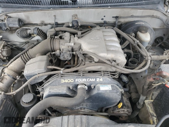 2004 Toyota Tacoma z VIN 5TEWN72NX4Z405026, wystawiony jako Copart lot #49938535 z przebiegiem 171 082 mil mil oraz Szkoda całkowita • Salvage title. Historia ofert i sprzedaży dostępna na DreamBid. Obrazek 12.