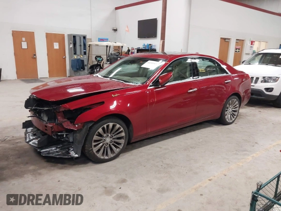 2016 Cadillac CTS Luxury Collection AWD z VIN 1G6AX5SX6G0124584, wystawiony jako IAAI lot #41235515 z przebiegiem 82 286 mil mil oraz . Historia ofert i sprzedaży dostępna na DreamBid. Obrazek 20.