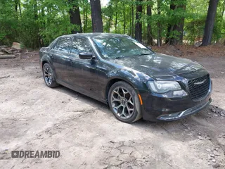2015 Chrysler 300 with VIN 2C3CCABGXFH763155, listed as a IAAI auction lot 42213899 with 102,479 mi miles. Bid and sale history available at carsss.com. Image 1.