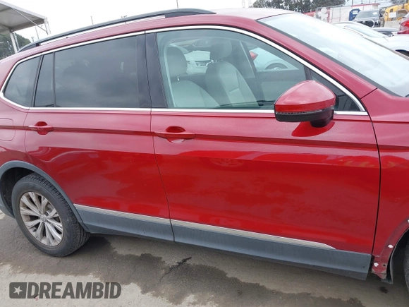 2018 Volkswagen Tiguan SEL with VIN 3VV3B7AX9JM031453, listed as a IAAI auction lot 42084781 with 82,931 mi miles and . Bid and sale history available at DreamBid. Image 14.