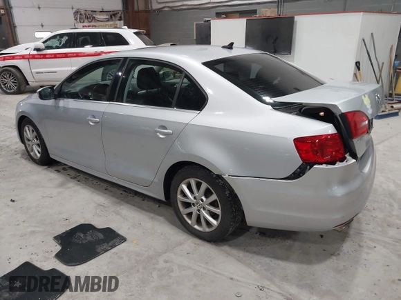 2014 Volkswagen Jetta Sedan SE w/Connectivity/Sunroof PZEV with VIN 3VWD17AJ9EM437804, listed as a IAAI auction lot 42026842 with 83,114 mi miles. Bid and sale history available at carsss.com. Image 3.
