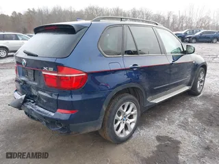 2011 BMW X5 35i with VIN 5UXZV4C54BL738262, listed as a IAAI auction lot 41633474 with 173,914 mi miles. Bid and sale history available at carsss.com. Image 4.