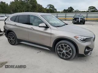 2022 BMW X1 sDrive28i with VIN WBXJG7C07N5V39345, listed as a Copart auction lot 41490005 with 26,894 mi miles and Salvage Title. Bid and sale history available at carsss.com. Image 4.