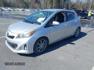 2013 Toyota Yaris L with VIN JTDKTUD3XDD558030, listed as a IAAI auction lot 41775567 with 246,051 mi miles. Bid and sale history available at carsss.com. Image 2.