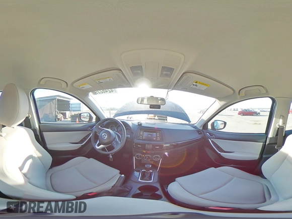 2015 Mazda CX-5 Sport z VIN JM3KE2BE6F0491107, wystawiony jako Copart lot #42462395 z przebiegiem 82 528 mil mil oraz Szkoda całkowita • Salvage title. Historia ofert i sprzedaży dostępna na DreamBid. Obrazek 13.