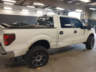 2013 Ford F-150 XL with VIN 1FTFW1ET8DFB48563, listed as a IAAI auction lot 42103243 with 257,778 mi miles. Bid and sale history available at carsss.com. Image 6.
