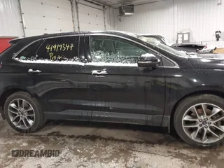 2015 Ford Edge Titanium z VIN 2FMTK4K91FBB27482, wystawiony jako IAAI lot #41919347 z przebiegiem 177 268 mil mil oraz . Historia ofert i sprzedaży dostępna na DreamBid. Obrazek 13.