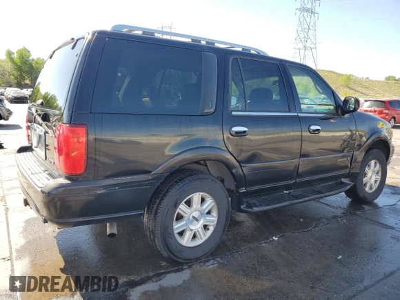 2002 Lincoln Navigator z VIN 5LMFU28R42LJ11223, wystawiony jako Copart lot #57127995 z przebiegiem 170 321 mil mil oraz Szkoda całkowita • Salvage title. Historia ofert i sprzedaży dostępna na DreamBid. Obrazek 3.