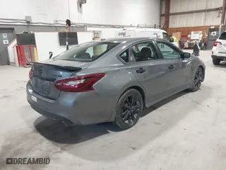 2018 Nissan Altima 2.5 SV with VIN 1N4AL3AP5JC470135, listed as a IAAI auction lot 41801045 with 122,452 mi miles. Bid and sale history available at carsss.com. Image 4.