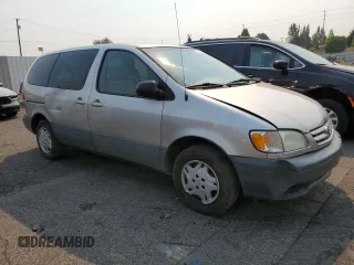 2001 Toyota Sienna CE with VIN 4T3ZF19C11U412899, listed as a Copart auction lot 70303244 with 190,025 mi miles and Salvage Title. Bid and sale history available at carsss.com. Image 4.