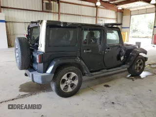 2016 Jeep Wrangler Unlimited Sahara с VIN 1C4HJWEG3GL235476, выставлен на аукционе Copart как лот 63342605 с пробегом 133 785 миль миль и Списание • Salvage title. История ставок и продаж доступна на DreamBid. Изображение 3.