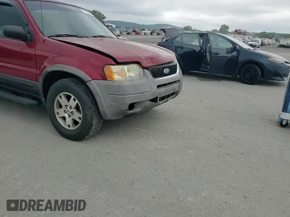2004 Ford Escape XLT z VIN 1FMYU03104KB51972, wystawiony jako Copart lot #62119665 z przebiegiem 121 785 mil mil oraz Szkoda całkowita • Salvage title. Historia ofert i sprzedaży dostępna na DreamBid. Obrazek 13.