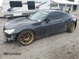 2015 Scion FR-S z VIN JF1ZNAA1XF9700396, wystawiony jako Copart lot #54936595 z przebiegiem 120 623 mil mil oraz Szkoda całkowita • Salvage title. Historia ofert i sprzedaży dostępna na DreamBid. Obrazek 1.