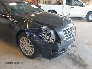 2012 Cadillac CTS with VIN 1G6DC5E55C0140174, listed as a IAAI auction lot 42186323 with 187,692 mi miles and . Bid and sale history available at DreamBid. Image 6.