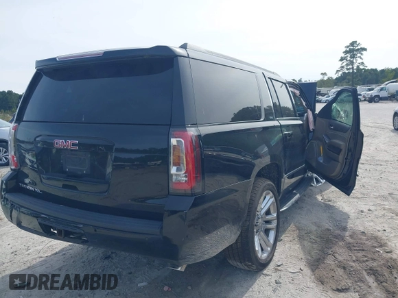 2019 GMC Yukon XL SLT with VIN 1GKS2GKCXKR359166, listed as a IAAI auction lot 40546837 with Not provided miles and . Bid and sale history available at DreamBid. Image 4.