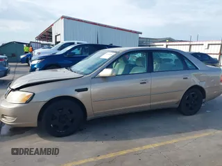 2001 Toyota Avalon XL z VIN 4T1BF28B31U185174, wystawiony jako IAAI lot #42338204 z przebiegiem 298 540 mil mil oraz . Historia ofert i sprzedaży dostępna na DreamBid. Obrazek 14.