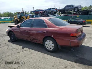 2000 Toyota Camry CE z VIN JT2BG22K4Y0449443, wystawiony jako Copart lot #58268475 z przebiegiem 292 853 mil mil oraz Szkoda całkowita • Salvage title. Historia ofert i sprzedaży dostępna na DreamBid. Obrazek 2.