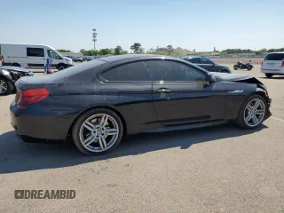 2015 BMW 6 Series z VIN WBALY1C57FDZ73541, wystawiony jako Copart lot #57294034 z przebiegiem 136 357 mil mil oraz Czysty tytuł • Clean title. Historia ofert i sprzedaży dostępna na DreamBid. Obrazek 3.