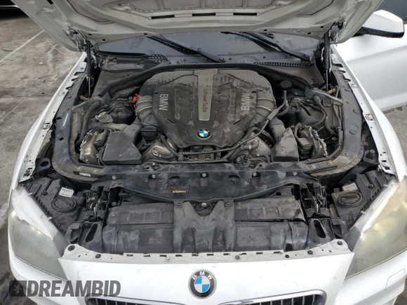 2014 BMW 6 Series 650i z VIN WBA6B2C59ED128936, wystawiony jako Copart lot #46409685 z przebiegiem 53 208 mil mil oraz Szkoda całkowita • Salvage title. Historia ofert i sprzedaży dostępna na DreamBid. Obrazek 11.
