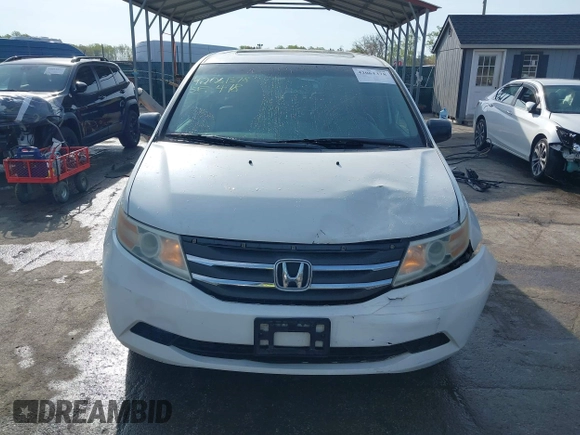 2011 Honda Odyssey EX-L with VIN 5FNRL5H6XBB059162, listed as a IAAI auction lot 42061378 with 164,317 mi miles and . Bid and sale history available at carsss.com. Image 12.