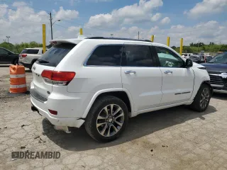 2017 Jeep Grand Cherokee Overland with VIN 1C4RJFCGXHC823593, listed as a Copart auction lot 58727205 with Not provided miles and Salvage title. Bid and sale history available at DreamBid. Image 3.