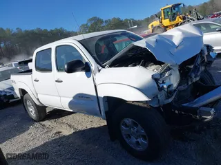 2014 Toyota Tacoma with VIN 5TFLU4EN1EX103052, listed as a IAAI auction lot 41653270 with 121,656 mi miles. Bid and sale history available at carsss.com. Image 13.