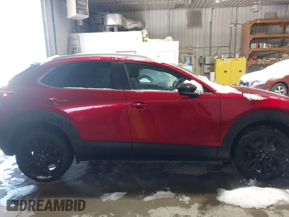 2022 Mazda CX-30 2.5 Turbo with VIN 3MVDMBAY5NM427943, listed as a IAAI auction lot 41585519 with 32,807 mi miles and . Bid and sale history available at DreamBid. Image 13.