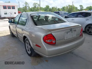 2001 Nissan Maxima GXE z VIN JN1CA31D61T622506, wystawiony jako IAAI lot #42344837 z przebiegiem 128 764 mil mil oraz . Historia ofert i sprzedaży dostępna na DreamBid. Obrazek 3.