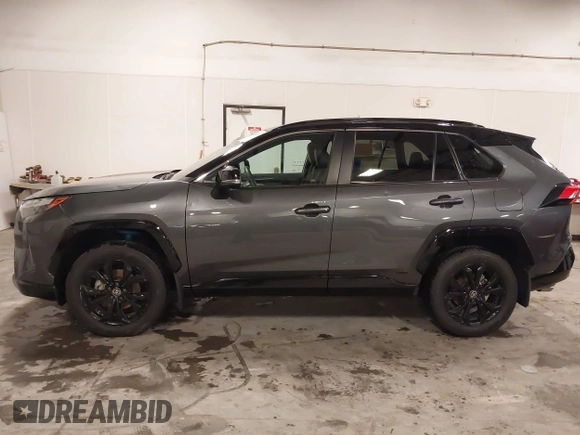 2023 Toyota RAV4 Hybrid XSE with VIN 4T3E6RFV7PU124140, listed as a IAAI auction lot 42201073 with 50,942 mi miles and . Bid and sale history available at DreamBid. Image 14.