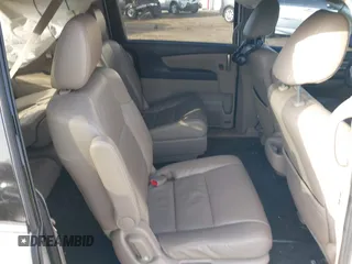 2014 Honda Odyssey Touring with VIN 5FNRL5H97EB037358, listed as a IAAI auction lot 41832825 with 208,894 mi miles and . Bid and sale history available at DreamBid. Image 8.