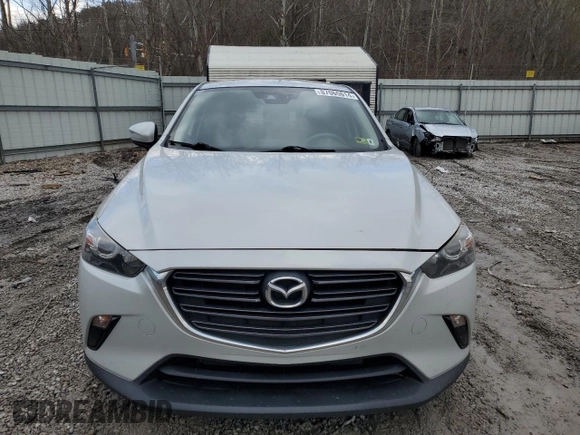2019 Mazda CX-3 Touring with VIN JM1DKFC78K0405131, listed as a Copart auction lot 87065614 with 91,091 mi miles and Salvage Title. Bid and sale history available at carsss.com. Image 5.